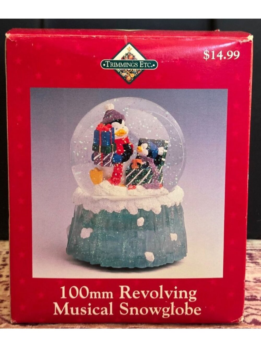 Trimmings Etc 100mm Revolving Musical Snow globe Penguins and Presents Christmas